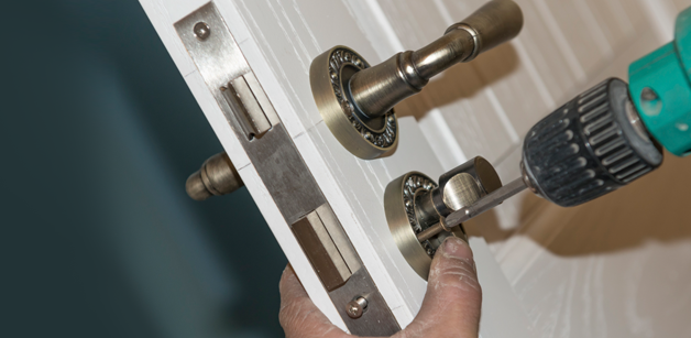 New lock being fitted to a door