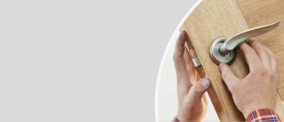 New lock being fitted to a wooden door